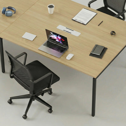 Modern office desk setup with laptop, mouse, and office chair.