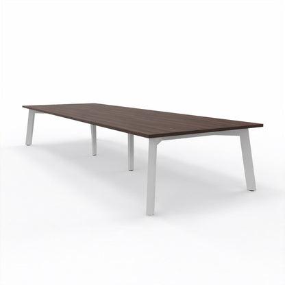 Large XXL Boardroom table with dark brown top and 4 legged white steel frame on a white background
