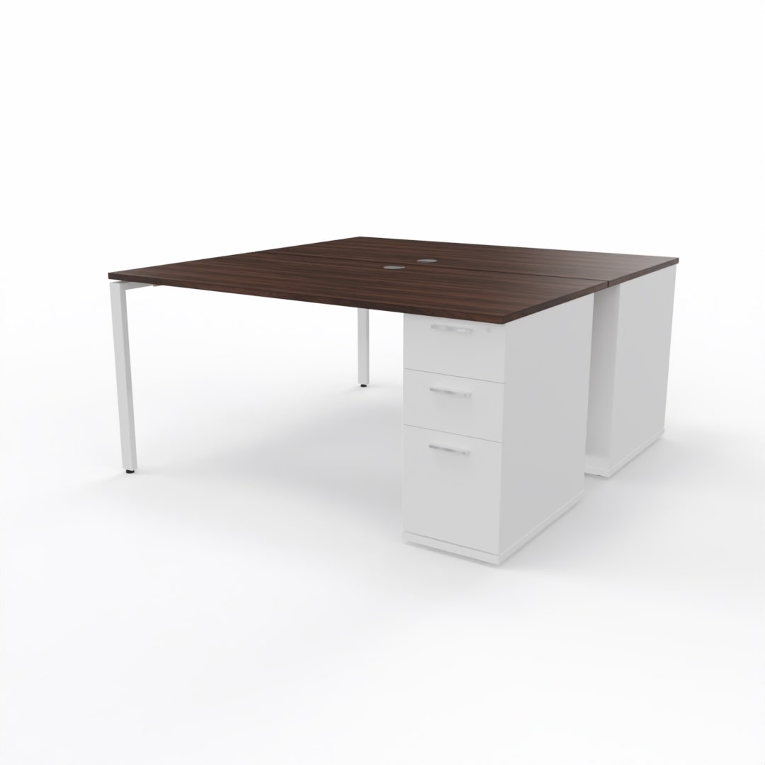 Dual desk workstation for two people with dark wooden table top, two white storage units, and a white steel frame on a plain white background