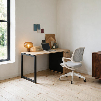 The Solo Desk with Storage in Barrel Oak and black, paired with an ergonomic task chair