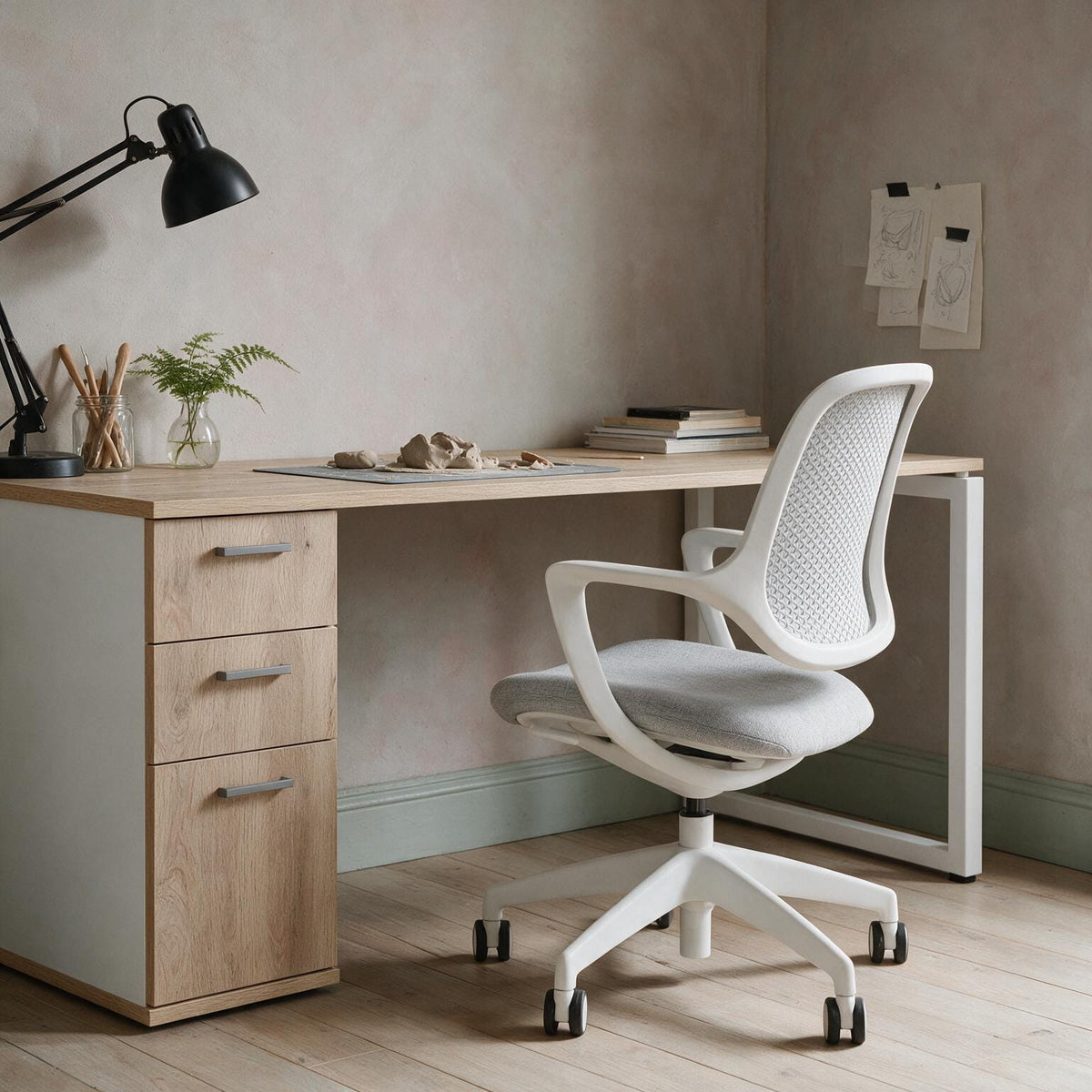 The Solo Desk with Storage in a home workspace, drawers on the right-hand side