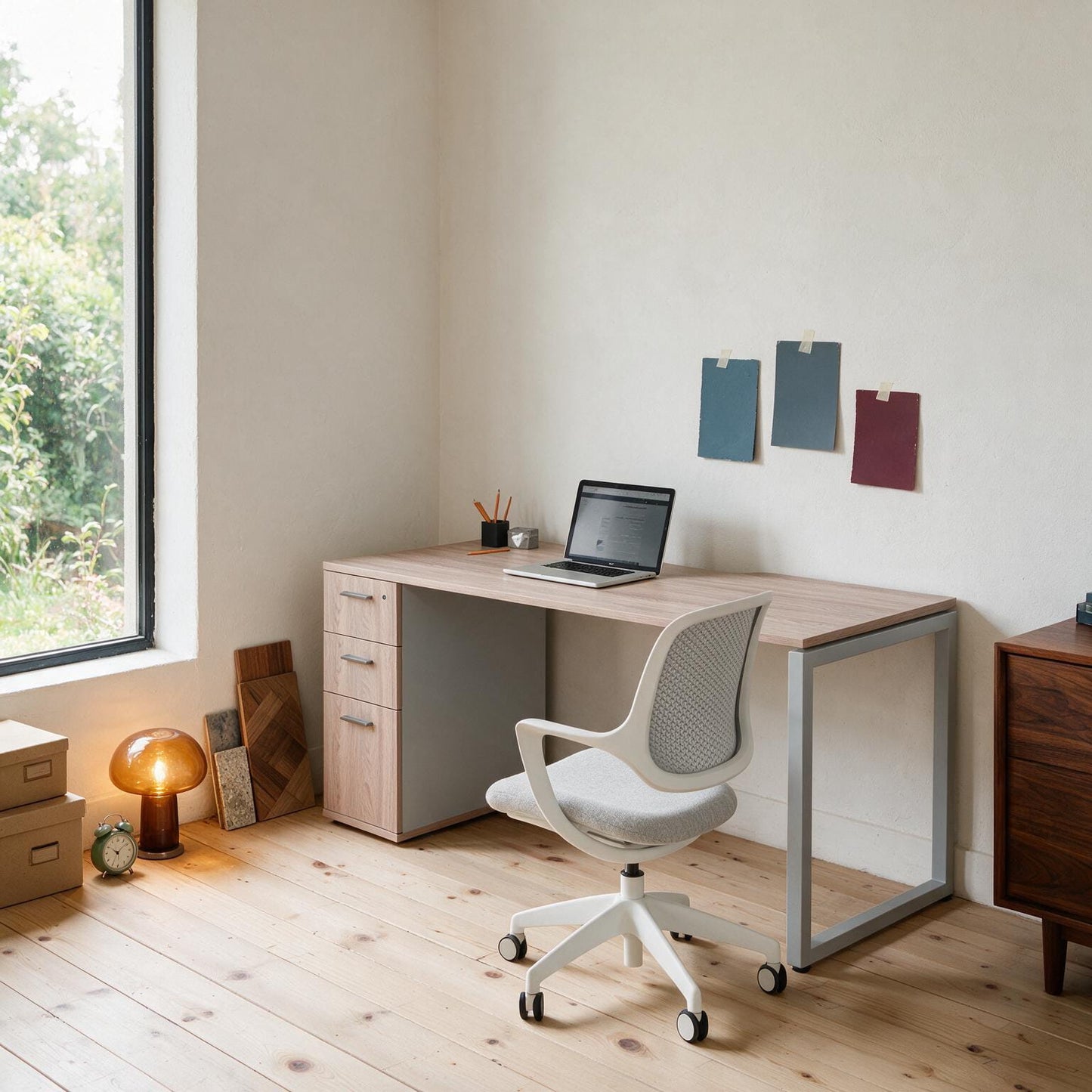 Home office desk with built-in storage styled with a monitor and desk accessories