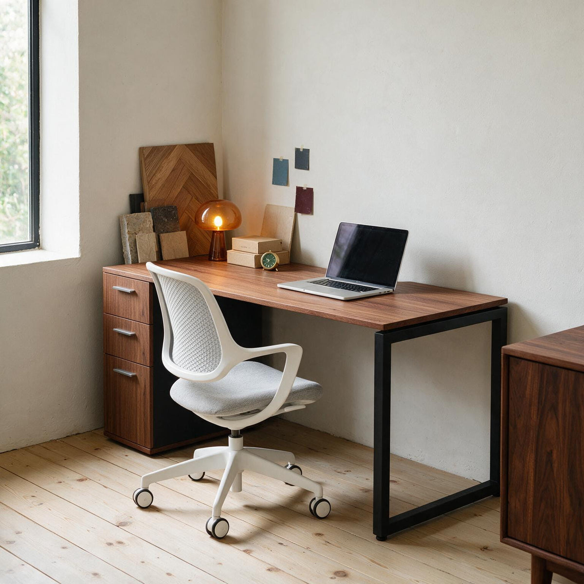The Solo Desk with Storage in a home study, viewed from the side
