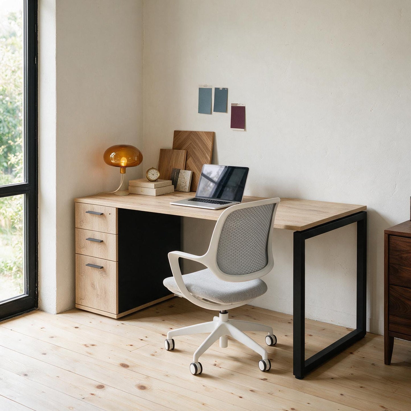 Home office desk with built-in drawers, shown in a lived-in room setting