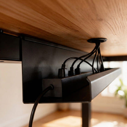 Under-desk power grid in use beneath a desk