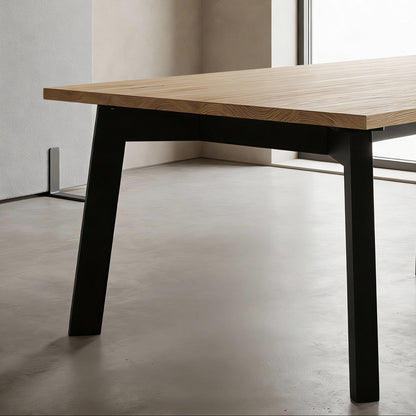 Wooden xxl boardroom tables with black legs in a modern office setting