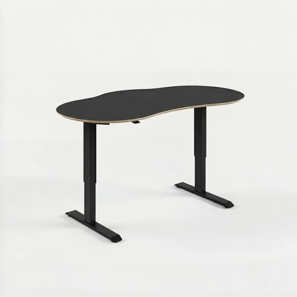 Modern black sit stand desk with a white background