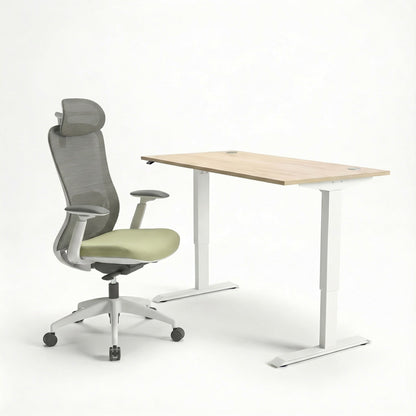 white Ergonomic chair with mesh headrest and adjustable sit stand desk on a white background