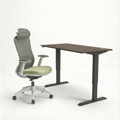 white Ergonomic chair and adjustable sit stand desk on a white background