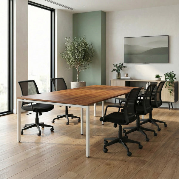 Modern office conference room with wooden meeting room table, black chairs, large window, big plant and a tv in the back