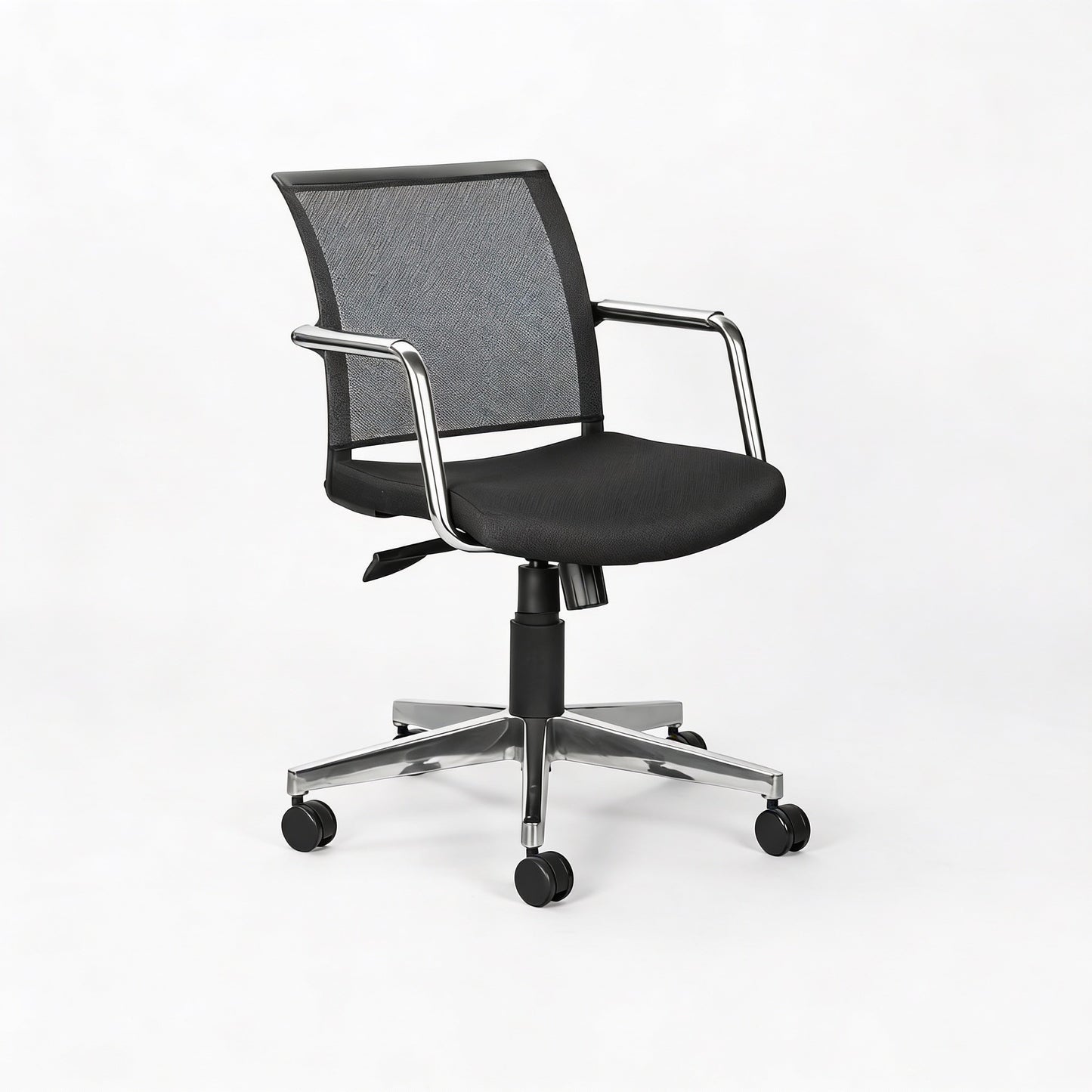 Black office meeting room chair with mesh backrest and chrome base and armrest on a white background