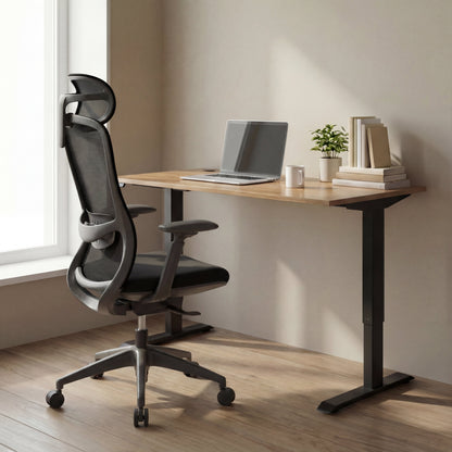 Modern office setup with a height adjustable desk and ergonomic chair office chair in black with mesh headrest.