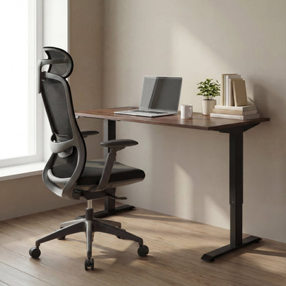 Modern office setup with a adjustable sit stand desk and black ergonomic office chair.