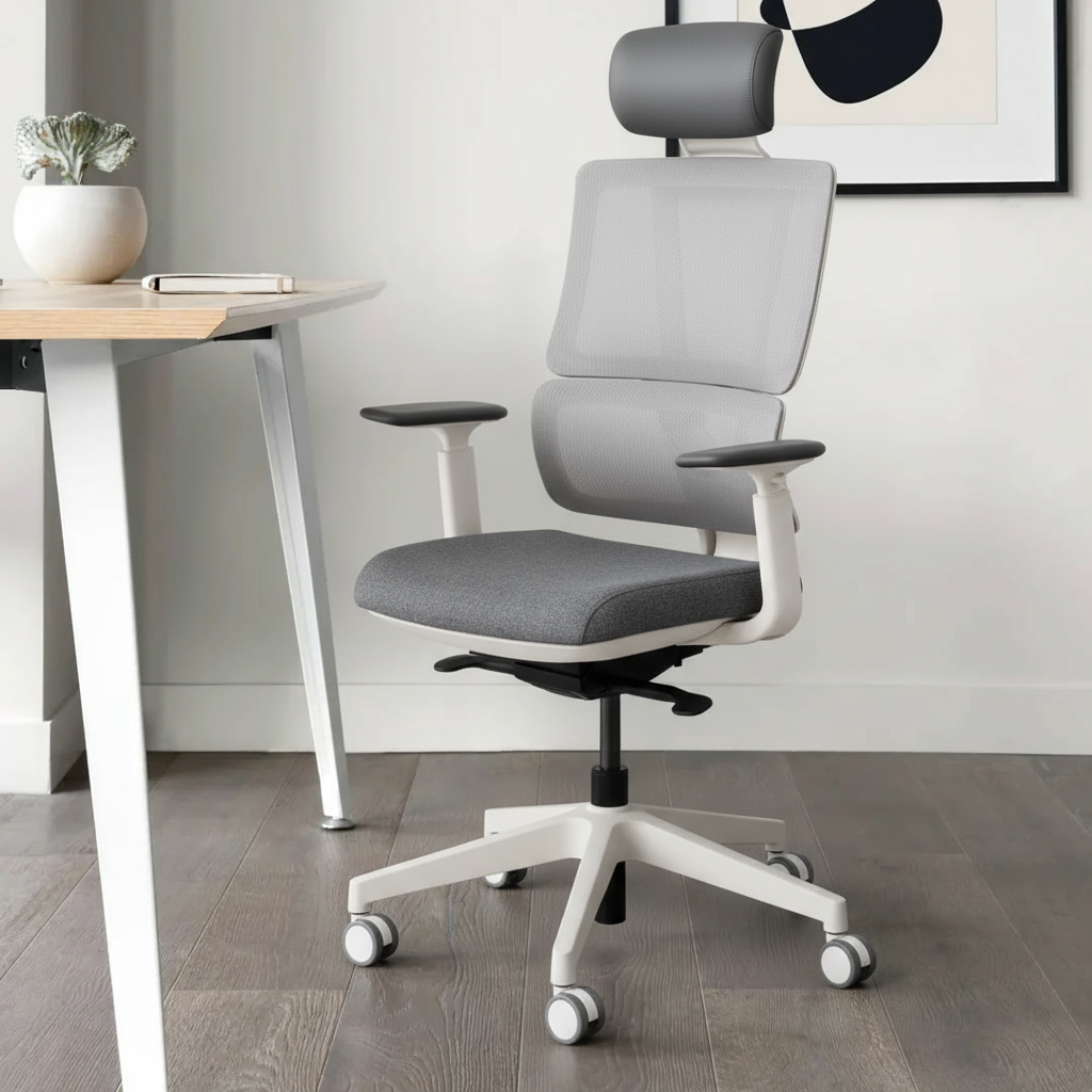 Gray home ergonomic office chair with white base in a modern office setting
